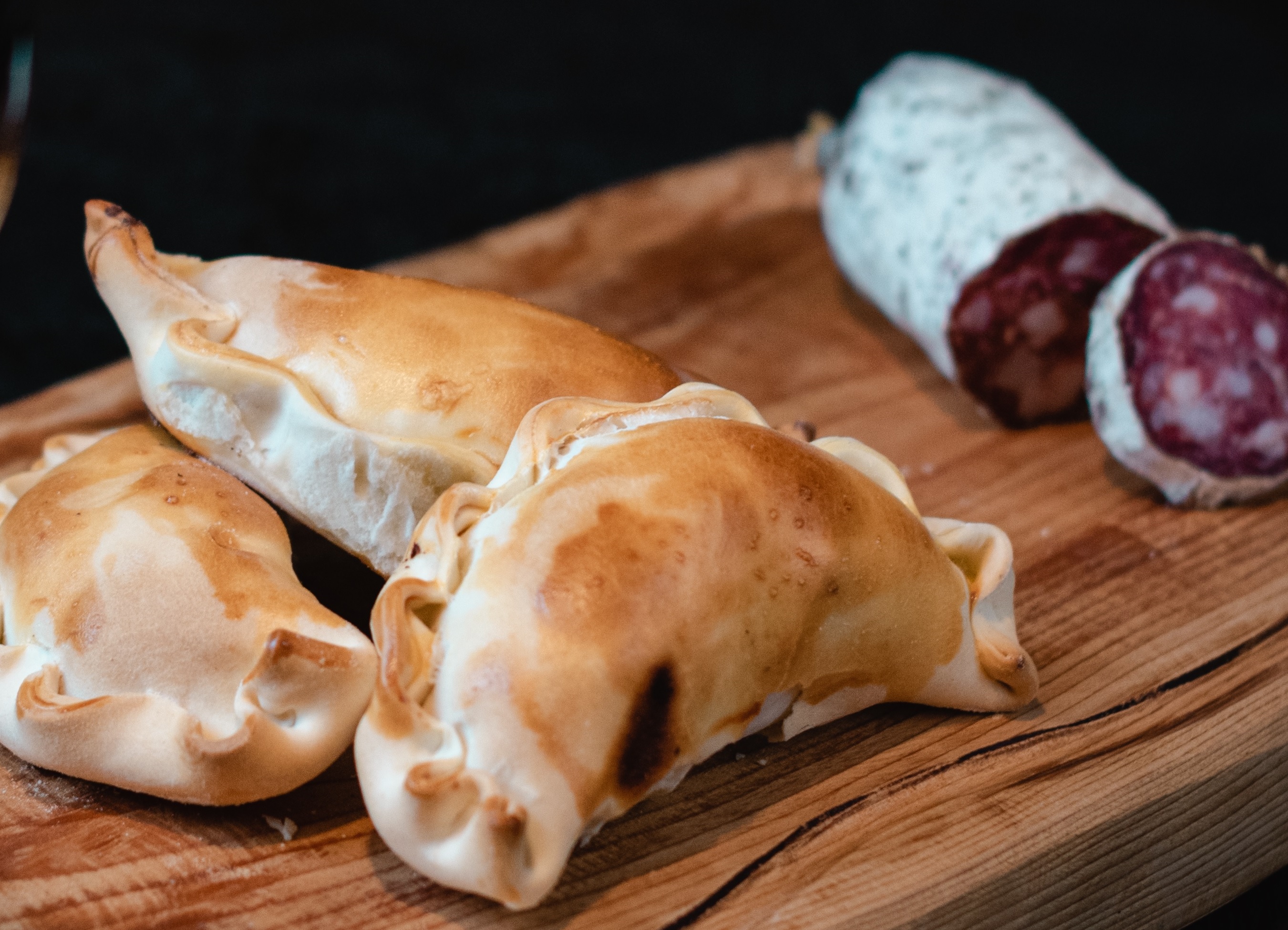 Authentic Colombian chicken empanada available at Bienvenidos Latin Market in Ottawa. Made with spiced chicken and Latin seasonings.